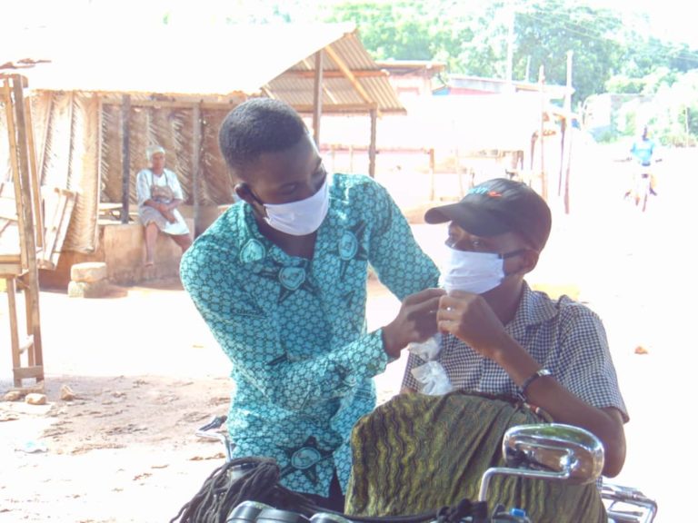 Nurse Distributes Free Nose Masks to Ketu South Residents